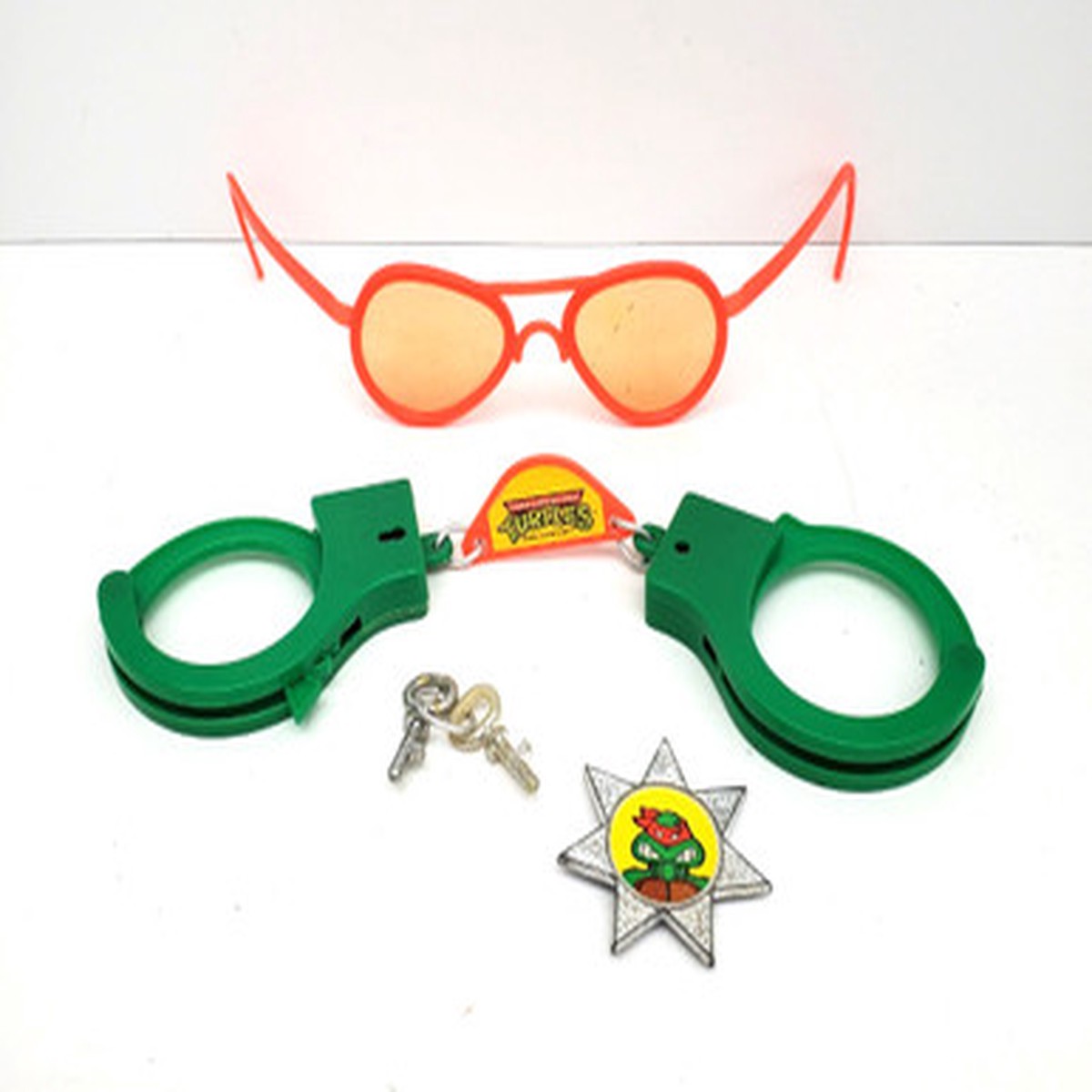 TEENAGE MUTANT NINJA TURTLES (1988 ) ACTION SET W/ BADGE GLASSES HANDCUFFS